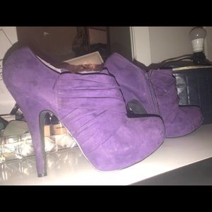 Purple heeled boots
